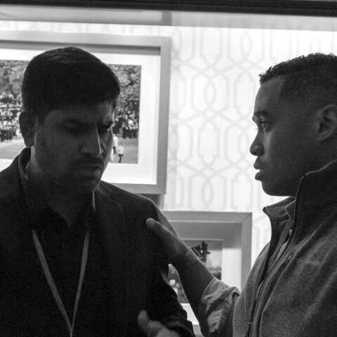 two people in a serious discussion