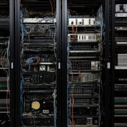 Old servers with untidy wires.
