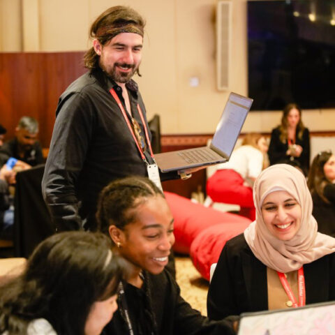 students and staff in a hackathon at Weill Cornell Medicine-Qatar